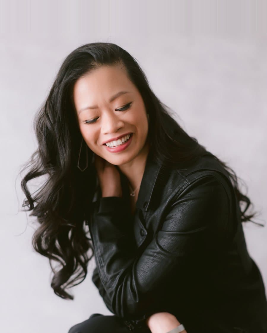Evelyn Lee laughing, personal portrait session, March 2026.